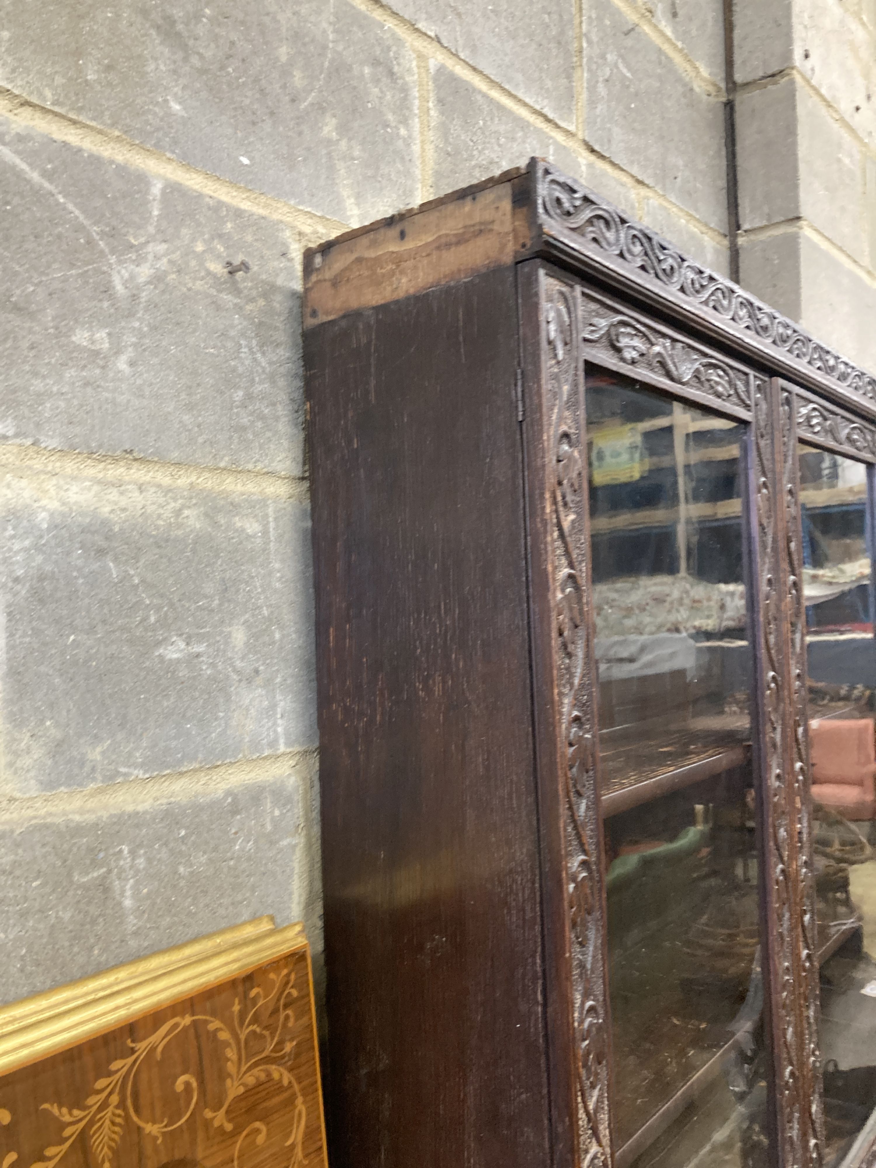 A Victorian carved oak bureau bookcase, width 94cm, depth 54cm, height 203cm